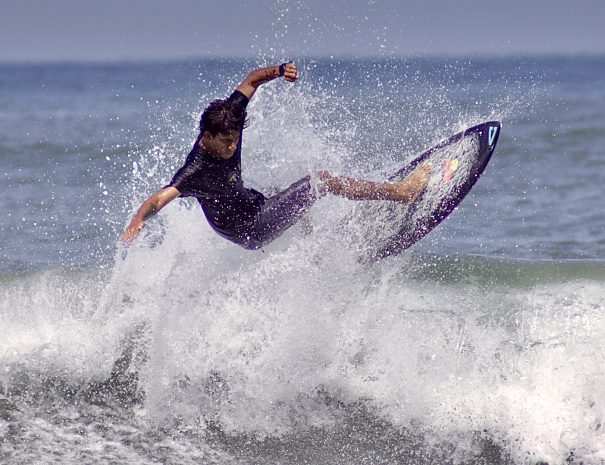 surfer cutting up the waves at playa guiones, Nosara Costa Rica