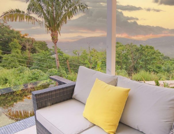 outdoor sitting area and infinity pool at villa 1, nosara, costa rica