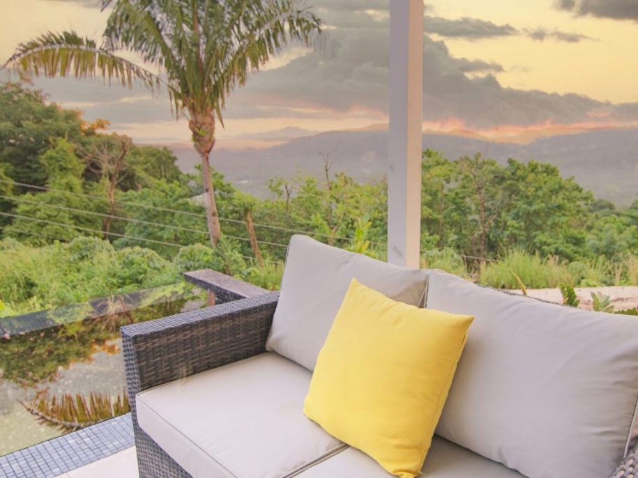 outdoor sitting area and infinity pool at villa 1, nosara, costa rica