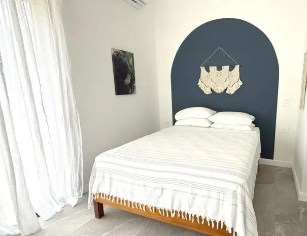 Cozy guest bedroom in Villa 1 at Sunset Sanctuary Nosara