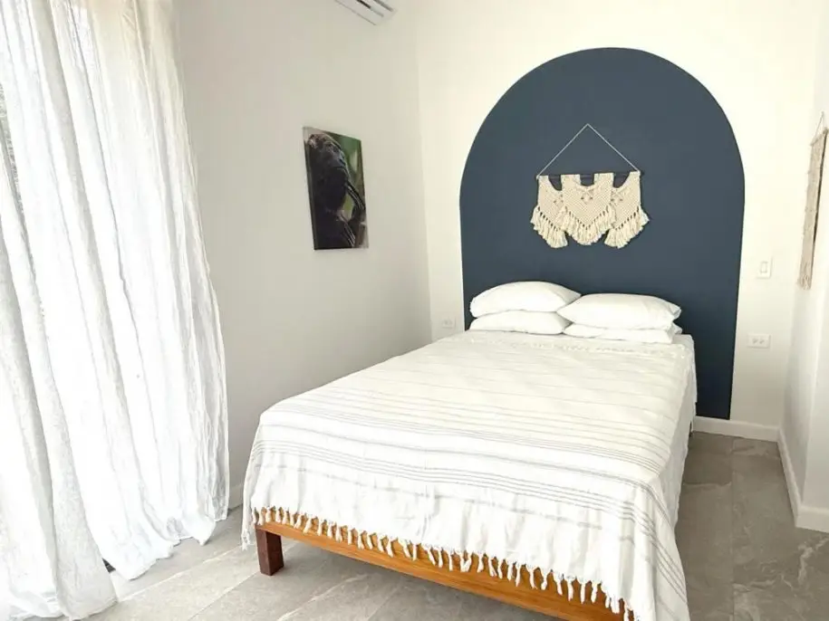 Cozy guest bedroom in Villa 1 at Sunset Sanctuary Nosara