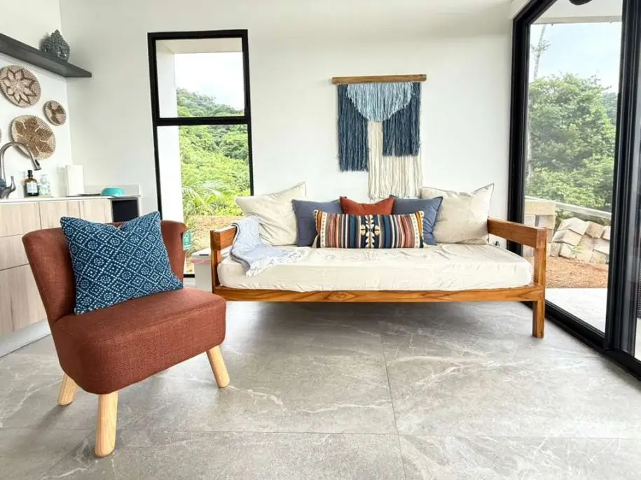 Modern open-plan living space in Villa 1, Nosara vacation rental