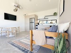 Villa Sueno kitchen - full stocked kitchen with dining table, day bed and TV